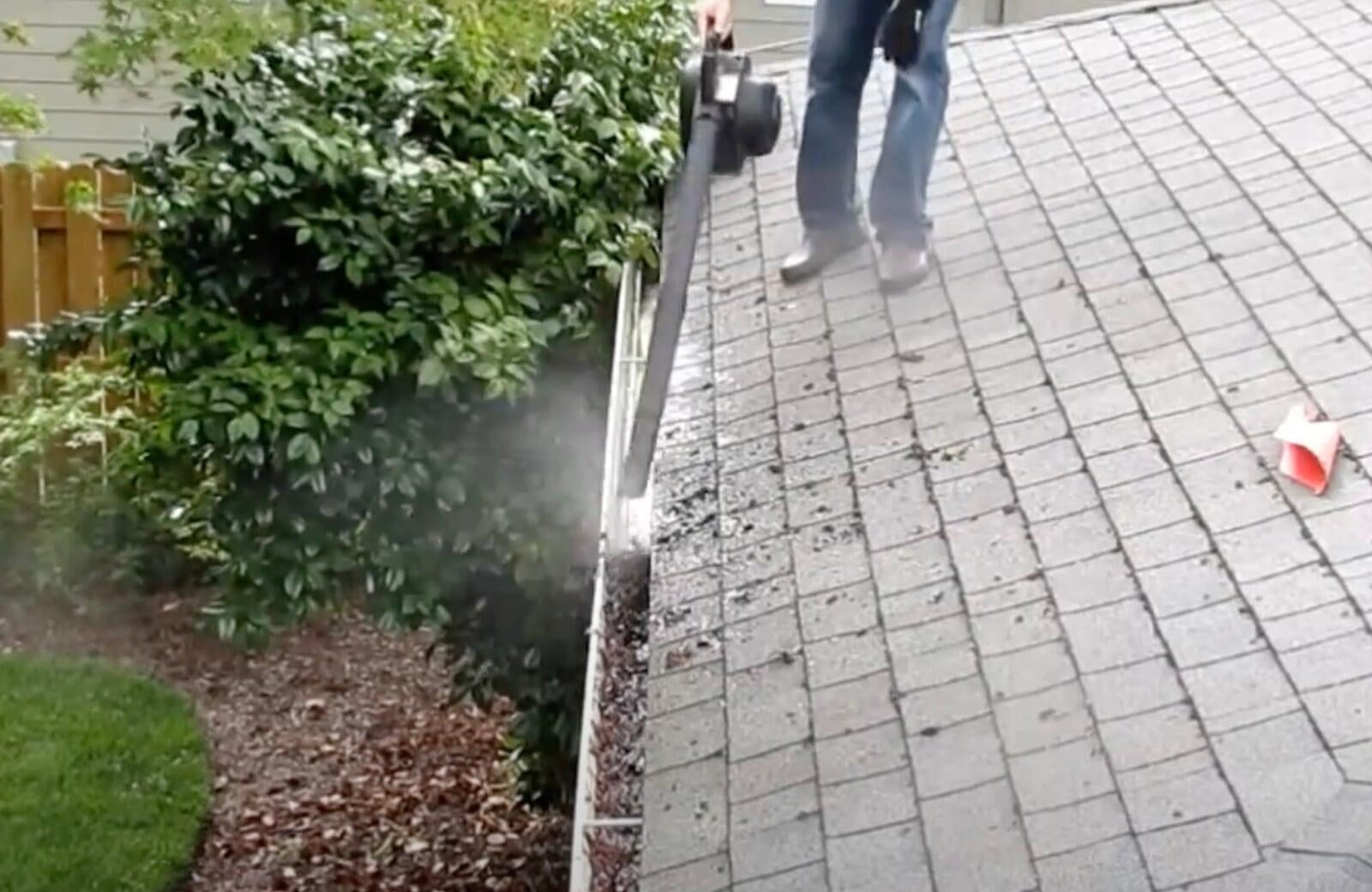 Gutter cleaning using an air blower