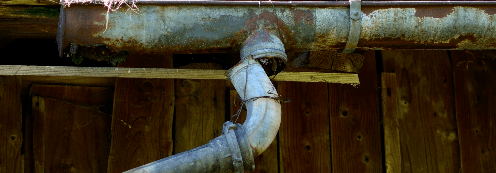 separated and rusty gutters